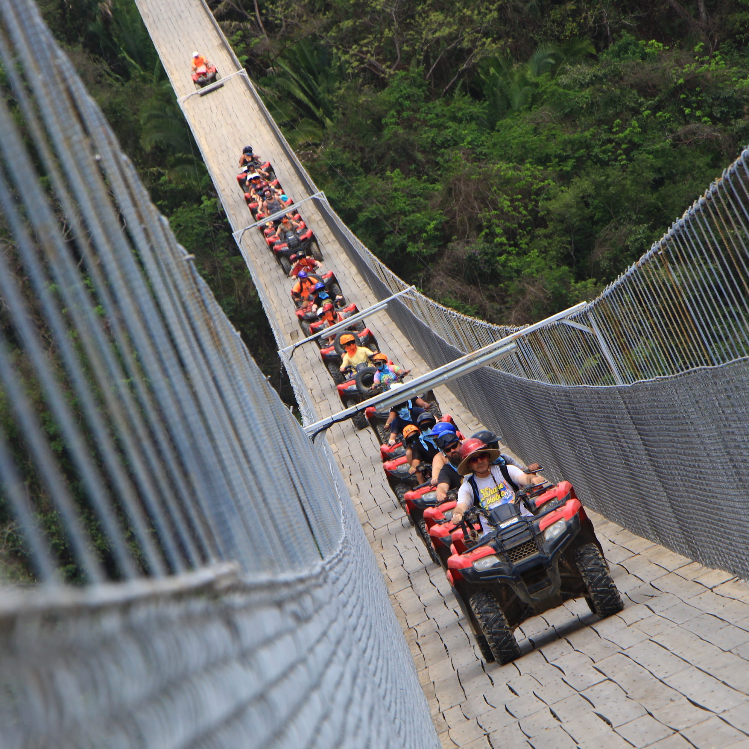Now you are driving your ATV and crossing the longest suspension traffic bridge of the world